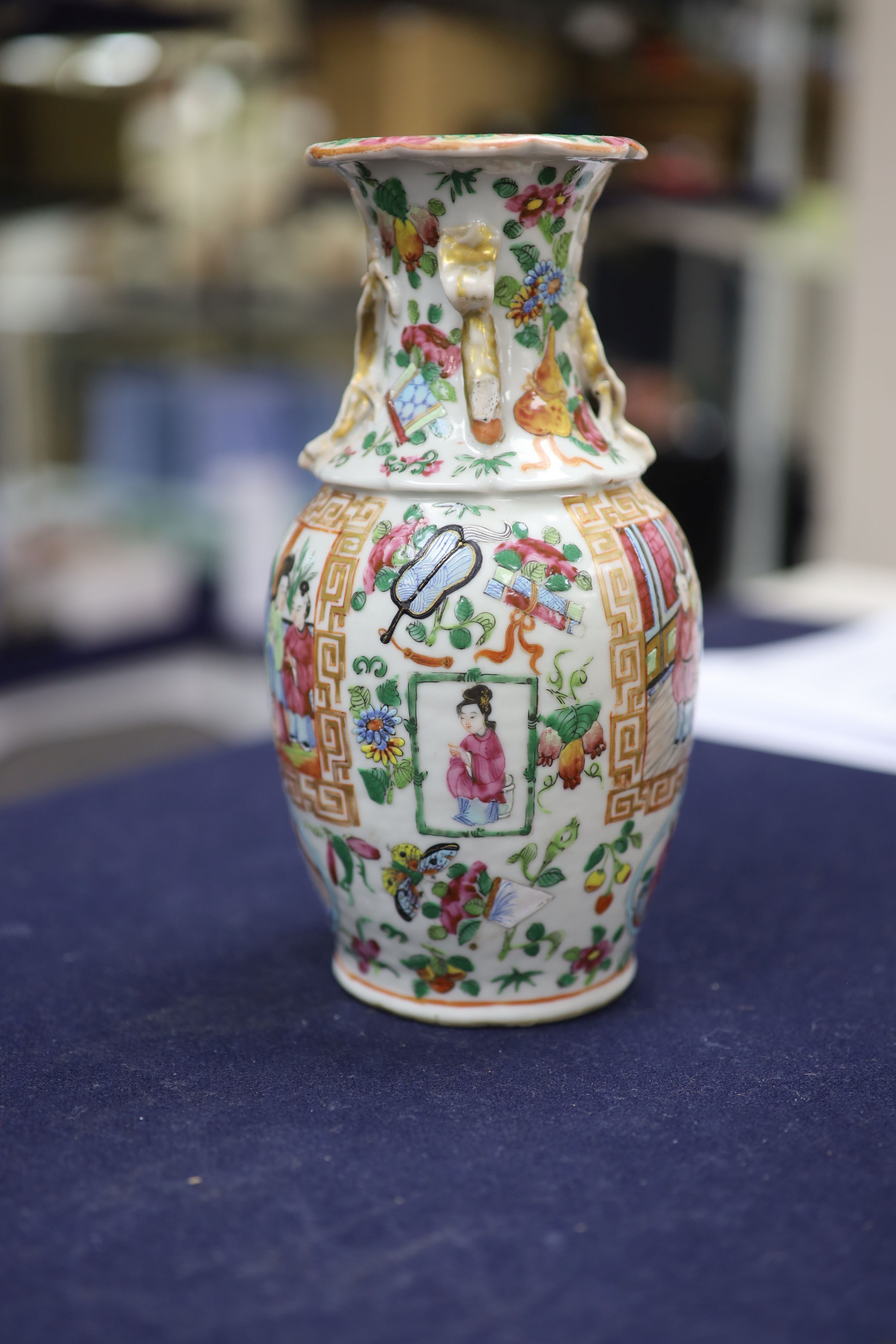 A Chinese famille verte jar and cover and a Canton famille rose vase, tallest 22cm